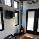 Wood stove burning in a tiny home.